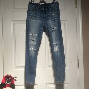 Buckle Light Blue Distressed Skinny Jeans